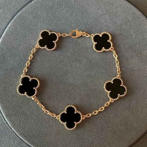 Radiant Black Clover Charm Bracelet | Polished Gold Link Jewelry