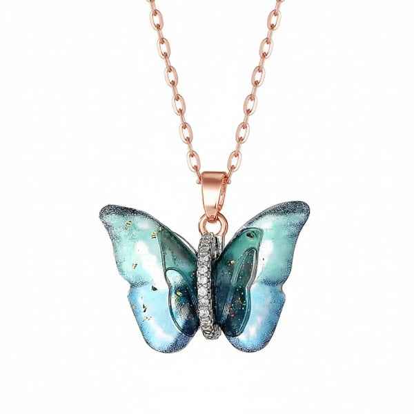 Ethereal Butterfly Resin Necklace – Rose Gold & Glittering Blue