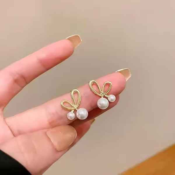 Dainty Gold Bow Pearl Stud Earrings – Elegant & Playful Design