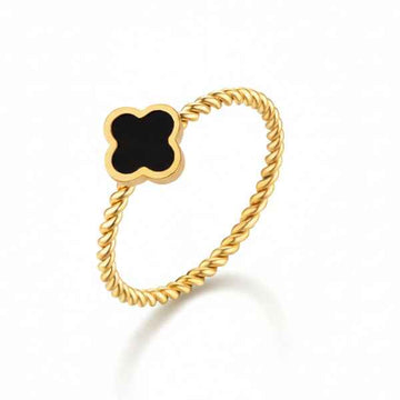 Stunning Gold Clover Ring with a Twisted Band and Black Quatrefoil