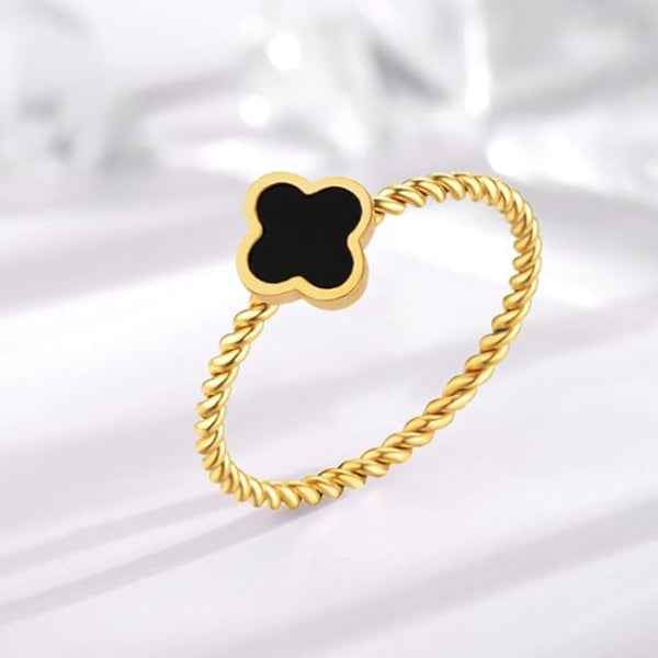 Stunning Gold Clover Ring with a Twisted Band and Black Quatrefoil