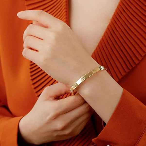 Modern Gold Screw Bangle Bracelet | Iconic Polished Cuff Jewelry