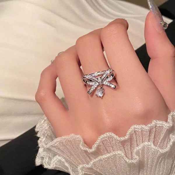 Silver Bow Ring: Dangle Charm Ring with Sparkling CZ Crystal Band