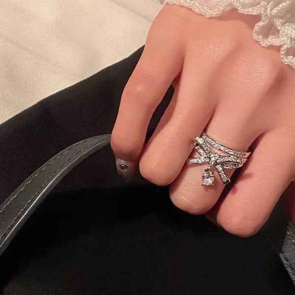 Silver Bow Ring: Dangle Charm Ring with Sparkling CZ Crystal Band