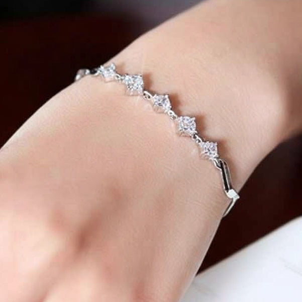 Silver Bracelet with Wave Link Design & Sparkling Cubic Zirconia