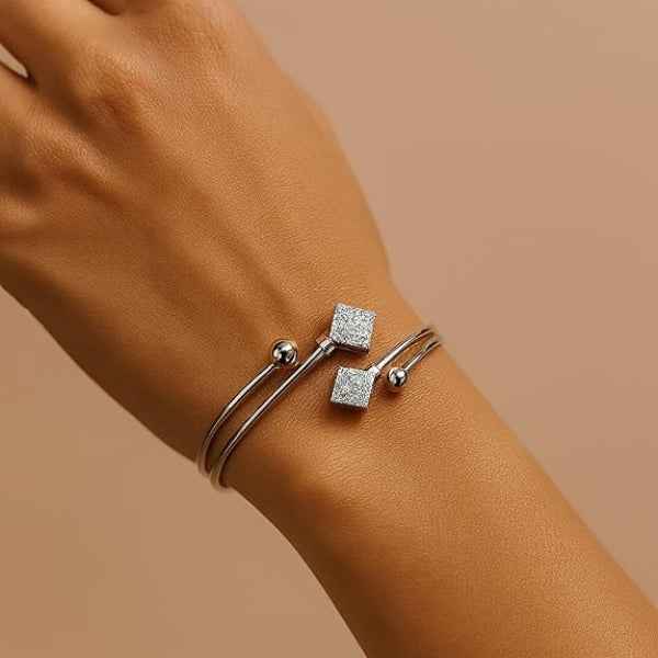Silver Bypass Bangle with Glittering Rhombus charms and Ball Accents