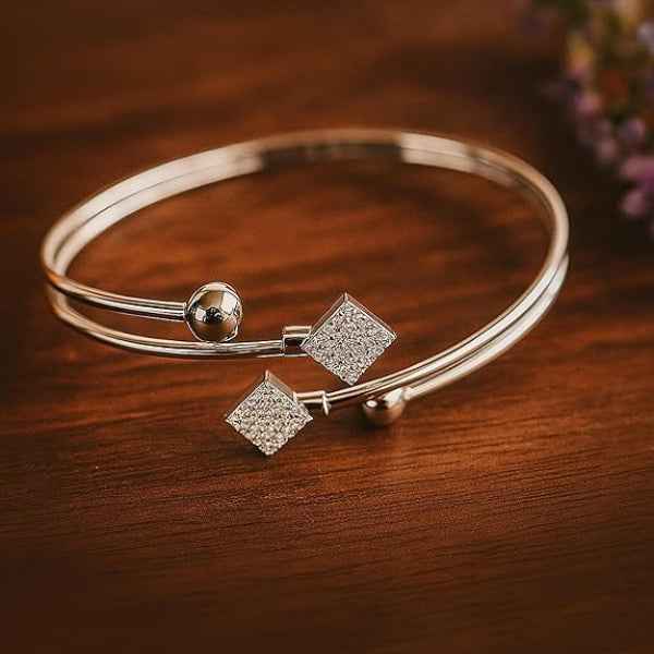 Silver Bypass Bangle with Glittering Rhombus charms and Ball Accents