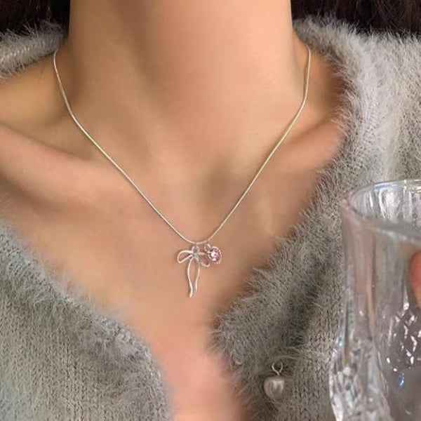 Silver Heart Necklace with Pink Crystal Charm and Dainty Bow Pendant